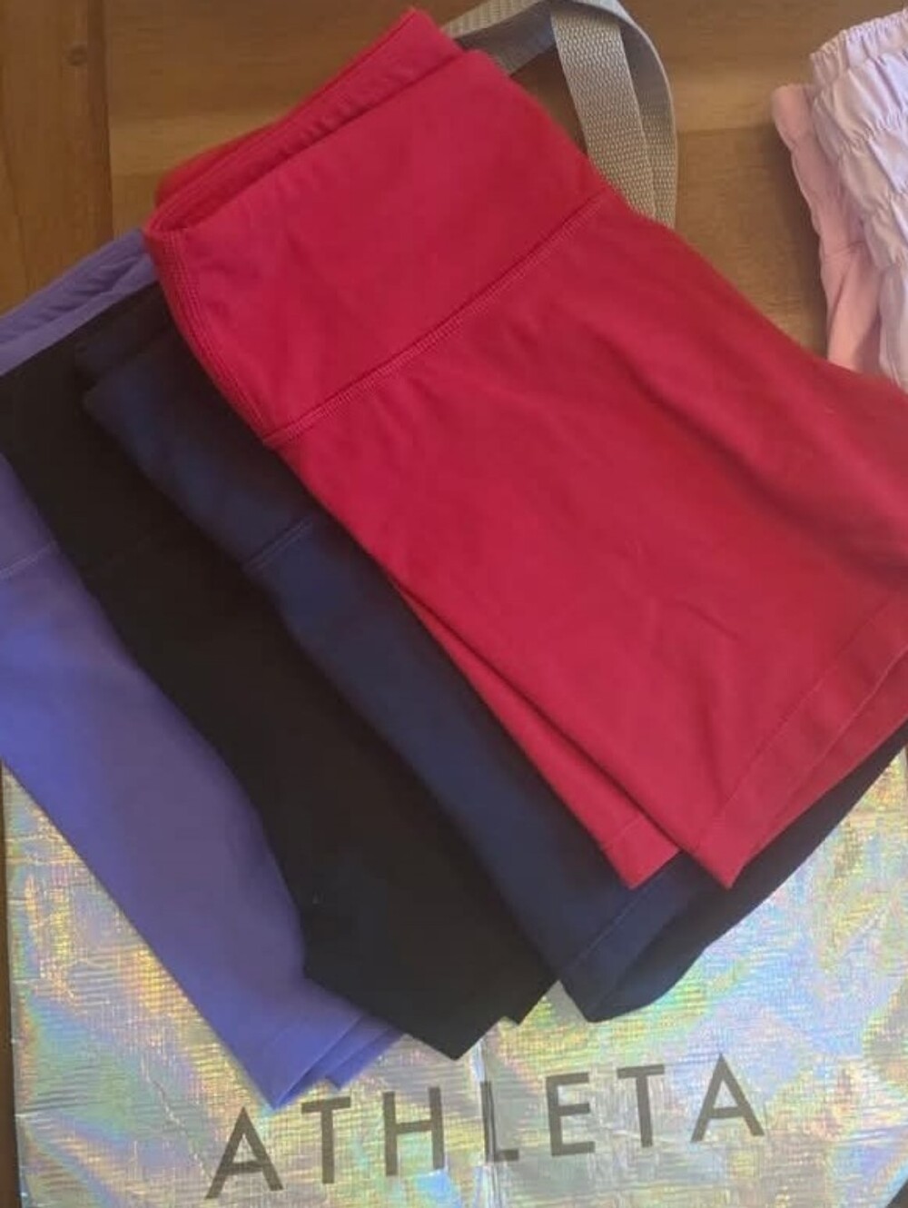 Athleta Girl Four-Pack Active Shorts in Red, Black, Navy, Purple